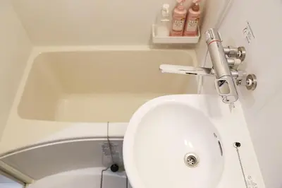 a bathroom with a white sink and a toilet at Pr41\u4e0b\u843d\u5408 in Tokyo