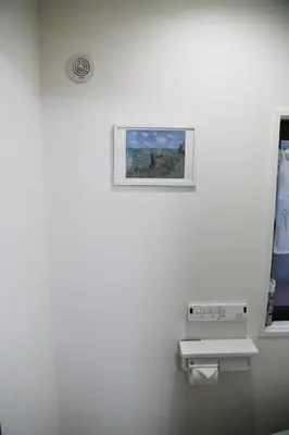 a picture on the wall of a bathroom at Pr41\u4e0b\u843d\u5408 in Tokyo