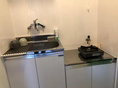 a small kitchen with a sink and a counter top at \u685c\u5c4bSakuraya201 in Tokyo