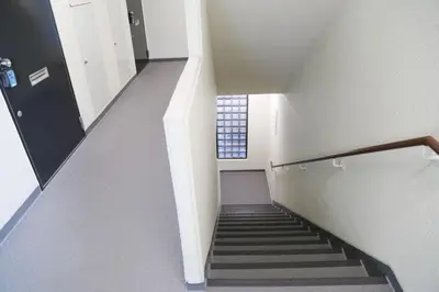 a staircase in a building with a window at Pr43 \u4e0b\u843d\u5408 in Tokyo