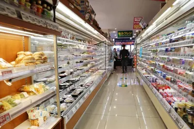 a store aisle of a grocery store filled with food at Pr43 \u4e0b\u843d\u5408 in Tokyo