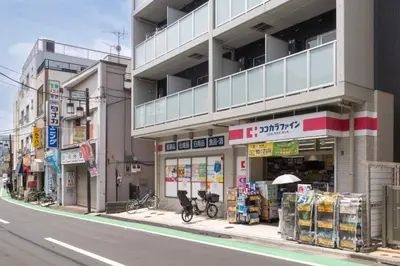 a building on a city street with a store at MAT ARAIYAKUSHI East in Tokyo