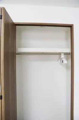 a closet with a white wall and a shelf at Pr52\u4e0b\u843d\u5408 in Tokyo
