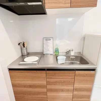 a kitchen counter with a sink and a sink at \u30a2\u30f3\u30c9\u30b9\u30c6\u30a4\u91ce\u65b92\u4e01\u76ee in Tokyo