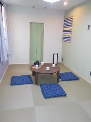 a room with a table and blue cushioned chairs at CS Asakusa Building 2nd floor - Vacation STAY 95354v in Tokyo
