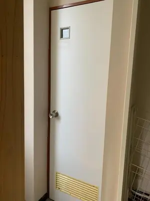 a white door with a sign on top of it at CS Asakusa Building 2nd floor - Vacation STAY 95354v in Tokyo