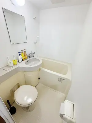 a small bathroom with a toilet and a sink at Tokyo Stay Ikebukuro #303 in Tokyo