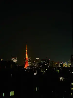 a view of a lit up city at night at \u9ad8\u8f2a\u30fc703 in Tokyo