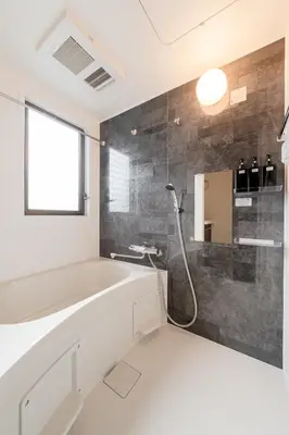 a bathroom with a large tub and a shower at #32 -\u670d\u90e8\u30d3\u30eb\u6771\u6c60\u888b- Condo in Tokyo