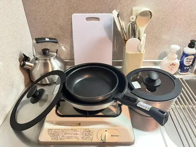a frying pan sitting on top of a stove at Amika First 202 AF22 in Tokyo