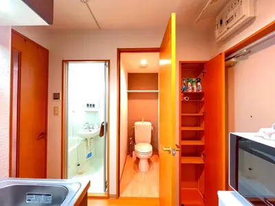 a bathroom with a toilet and a sink at Amika First 202 AF22 in Tokyo