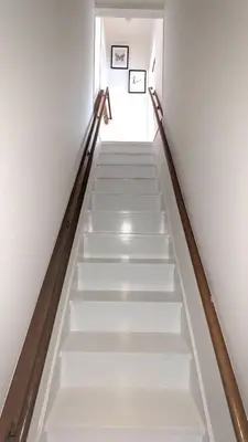 a stairway with white steps in a building at Higashi tateishi Kodate HTI1 in Tokyo