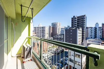 a balcony with a view of a city at SakuraFlat in Tokyo