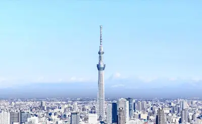 a view of the tokyo tower from the observation deck of the toky at tkm\u5317\u5c0f\u5ca91\u4e01\u76ee103 in Tokyo
