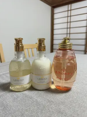 two bottles of vinegar sitting on top of a table at Style Lab\u56db\u3064\u6728 in Tokyo