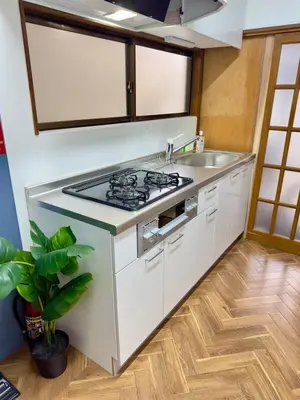 a kitchen with a stove and a sink at Style Lab\u56db\u3064\u6728 in Tokyo