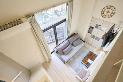 an overhead view of a living room with a couch and a window at N 5min to waseda sta designer condo high security free wifi in Tokyo