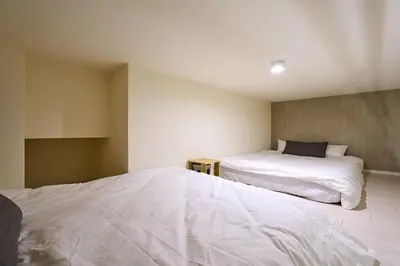 a bedroom with two beds in a room at N 5min to waseda sta designer condo high security free wifi in Tokyo