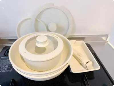a white bowl on a plate on a table at Minato Residence-Tokyo Tower-Daimon in Tokyo