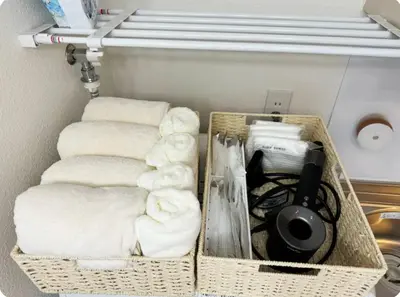 a group of towels in a closet at Minato Residence-Tokyo Tower-Daimon in Tokyo