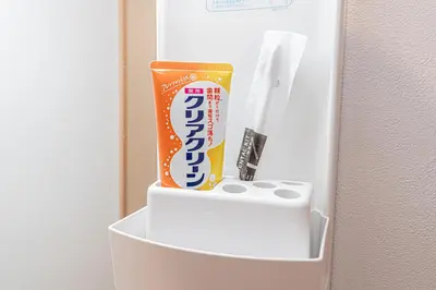 a refrigerator with a toothpaste and a can of soda at 2 min walking distance to station cozy room in central tokyo in Tokyo