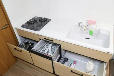 a kitchen counter with a sink and a sink at Km101 \u4e0a\u6c60\u888b in Tokyo