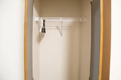 a closet with a shower curtain and a mirror at Km201\u4e0a\u6c60\u888b in Tokyo