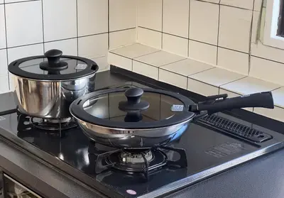 a pot on top of a stove in a kitchen at o\u30d3\u30eb301 in Tokyo