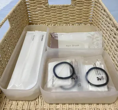 a hamper with a pair of glasses and a pair of scissors at SkyTree-402 in Tokyo