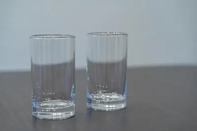 two glasses of water sitting on a table at APA SERVICED RESIDENCE SHINJUKU by unito in Tokyo