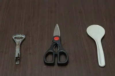 a pair of scissors and a spoon on a table at APA SERVICED RESIDENCE SHINJUKU by unito in Tokyo