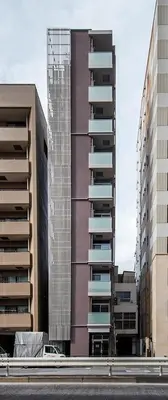 a tall building next to two tall buildings at STUMP SA MinamiAzabu in Tokyo