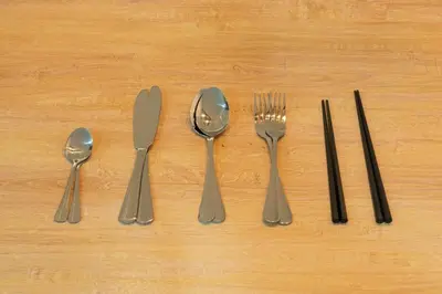a group of utensils sitting on top of a table at T4U Shinjyuku in Tokyo