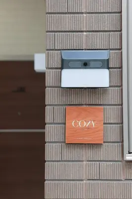 a sign on the side of a wall with an oggy box at Room #102 - Cozy Stay Higashi Ikebukuro in Tokyo