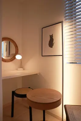 a room with a table and a stool and a mirror at Room #202 - Cozy Stay Higashi Ikebukuro in Tokyo