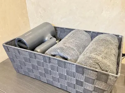 a blue basket with some items in it at Shinjuku downtown B2 in Tokyo