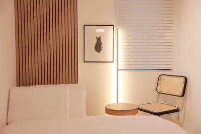 a bedroom with a bed and a chair and a window at Room #302 - Cozy Stay Higashi Ikebukuro in Tokyo