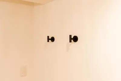 a white wall with the words hbos on it at Yadori\u795e\u697d\u5742 in Tokyo