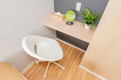 a white chair in a room with a desk at Komorebi Asakusa Cozy 4P Stay The 77 House Tokyo in Tokyo