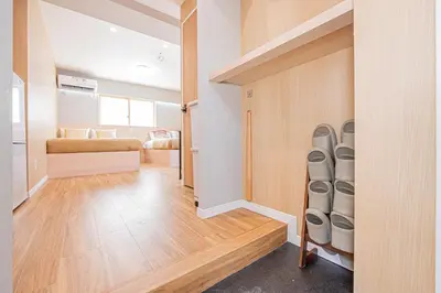 a room with a hallway with a stairwell with a room with at Komorebi Asakusa Cozy 4P Stay The 77 House Tokyo in Tokyo