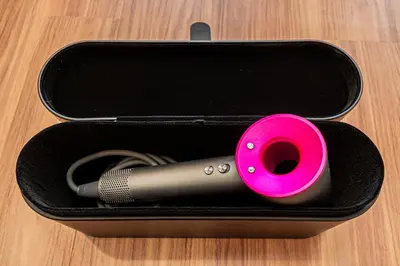 a black case with a pink item in it at Komorebi Asakusa A5 Cozy 4P StayThe 77 House Tokyo in Tokyo