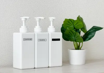 three white heaters sitting next to a potted plant at \u30a2\u30b9\u30d4\u30a2302 in Tokyo