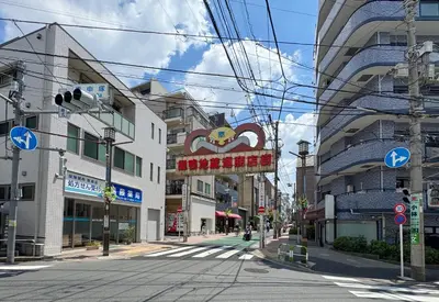 an empty street in a city with a building at \u30a2\u30b9\u30d4\u30a2302 in Tokyo