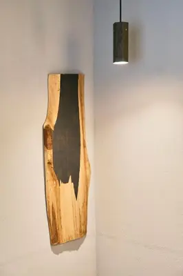 a wooden vase hanging on a wall at \u3077\u3075\u304b\u5186\u5fb3\u9418\u30f6\u6df5 in Tokyo