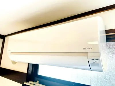 a close up of a microwave oven at AM's 502 Movie 5 min to Ikebukuro 13 min to Shinjuku Station 19 min to Shibuya Station with coworking space in Tokyo