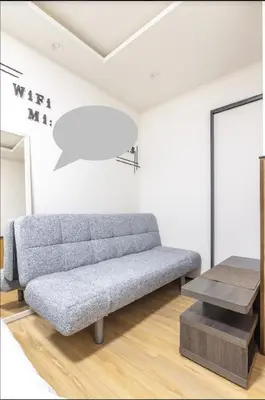 a living room with a couch and a table at \u65e5\u5f0f\u72ec\u680b#2\u95f4\u6d74\u5ba4#2\u4e2a\u536b\u751f\u95f4#2\u4e2a\u6d17\u9762\u53f0#\u6c60\u888b\u5730\u94c17\u5206#\u5b89\u9759\u8212\u9002Pachira869 in Tokyo