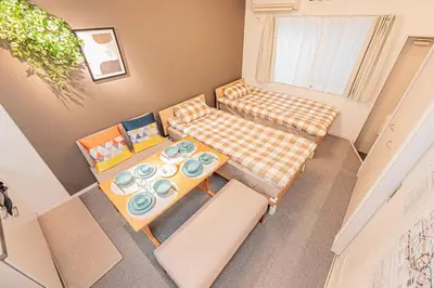 an overhead view of a room with a table and chairs at 8 min walk to JR Chuo Sobu Line Station Ground Floor Room 13 min to Tokyo Direct Train to Asakusa Shinjuku Ueno Akihabara 22sqm in Tokyo