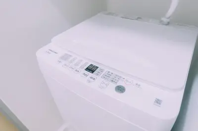 a close up of a washing machine with a thermometer at Showa Bloom Stay Near Shinjuku & Yoyogi in Tokyo