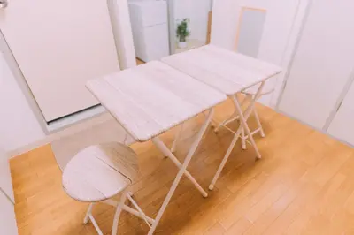 a white table and two chairs in a room at Showa Bloom Stay Near Shinjuku & Yoyogi in Tokyo