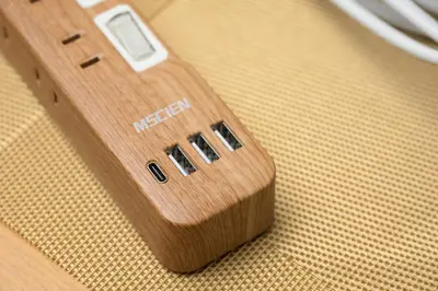 a wooden remote control sitting on top of a table at \u65b0\u5bbf\u99c54\u52062\u99c5\u304b\u3089\u5f92\u6b6910\u5206 \u6700\u59273\u540d \u9ad8\u901fWiFi 1\u968e\u306e\u307e\u308b\u307e\u308b\u8cb8\u5207\u90e8\u5c4b in Tokyo